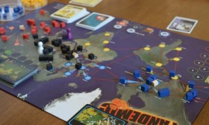 Players race around the board, removing disease cubes. Image from the Board Game Geek.